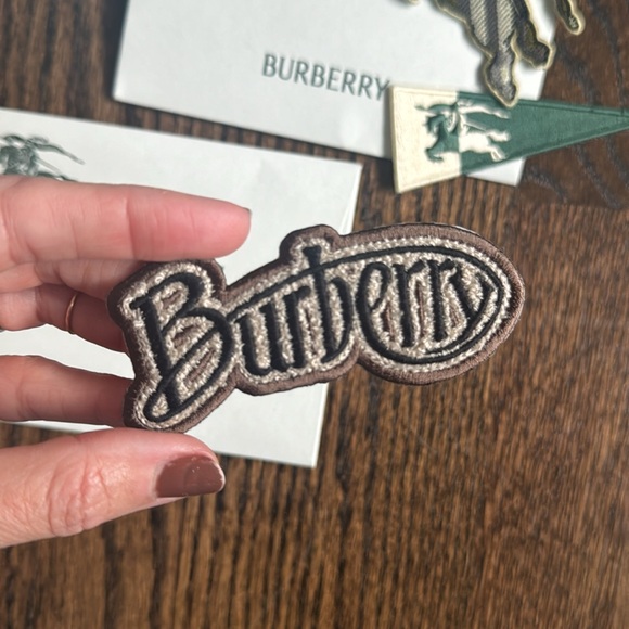 Authentic Burberry patches, given at a Burberry event. There are 4. - Picture 2 of 5